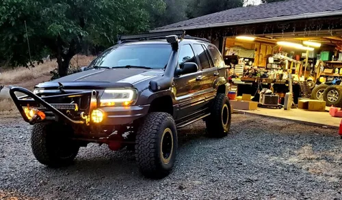 Miniatura 2 de AmeriLite Juego de faros delanteros de repuesto para Jeep Grand Cherokee 1999-2004 con barra de luz LED, color negro transparente, lado