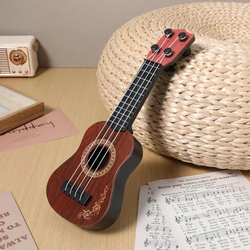 Miniatura 4 de Toddmomy Ukelele de juguete para niños de 4 cuerdas, mini instrumento de guitarra musical para niños pequeños, principiantes, aprendizaje y Marrón