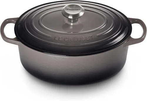 Miniatura 14 de Le Creuset Horno holandés ovalado Signature de hierro fundido esmaltado, 2.75 cuartos de galón., Blanco