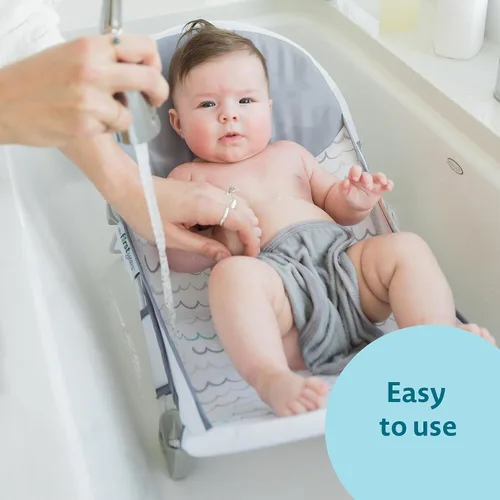 Miniatura 7 de The First Years Sure Comfort - Bañador plegable para bebé, asiento de baño y tumbona plegable para el hogar o sobre la marcha, para uso