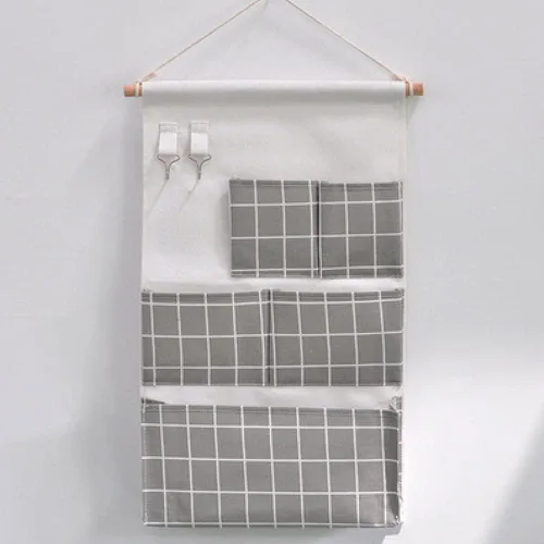 Inicio Bolsa colgante multifuncional Cesta colgante de tela para dormitorio Organizador misceláneo Bolsa colgante de pared de baño Bolsa detrás de