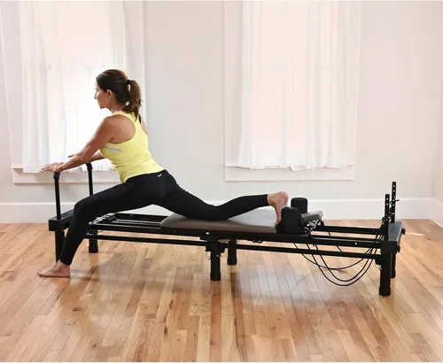 Miniatura 5 de Stamina Products AeroPilates Reformer 651 Máquina de entrenamiento de resistencia para todo el cuerpo para gimnasio en casa con soporte de 10