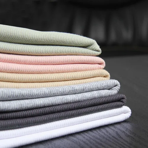 Miniatura 2 de GEMBERA Camiseta corta con cuello alto y espalda cruzada para mujer, sin mangas, ajustada, básica, de algodón