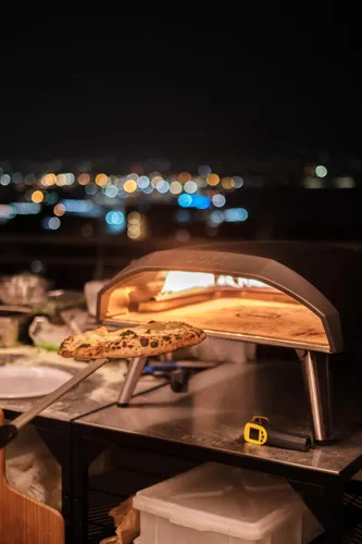 Miniatura 8 de ooni Pala Giratoria para Pizza - Pala para Pizza Perforada de Aluminio de 7 Pulgadas, Volteador de Pizza de Metal Ligero con Mango Largo