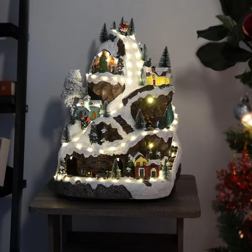 Miniatura 2 de Alpine Corporation Juego animado de invierno de 18 pulgadas de alto con 75 luces LED, música, tren móvil, decoración navideña de mesa Pueblo