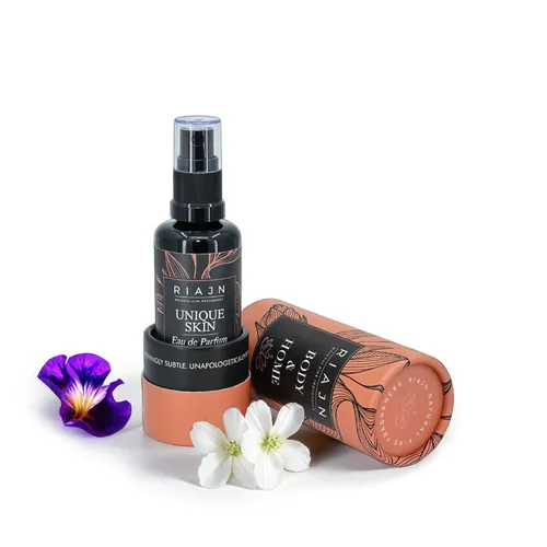 Unique Skin Eau de Parfum | Perfume unisex EDP de larga duración | Gris sel, lirio, plumeria y almizcle | Fragancia de iris leñoso para todas las
