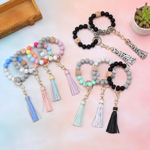Miniatura 7 de BAOSIWA Pulsera de cuentas de silicona con llavero de pulsera para mujer con borla de cuero