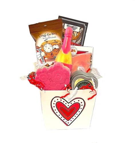 Cesta de regalo para el día de San Valentín llena de una mezcla de jabones, lociones, chocolates y mucho más. ¡El regalo perfecto para el día de San