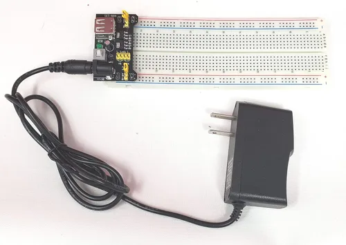 Adaptador de fuente de alimentación compatible con Arduino 9VDC 1A 110V AC 0.217 x 0.083 in Punta Positiva Parte # LJH -186