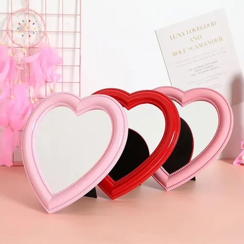 Miniatura 6 de Mokoze Espejo en forma de corazón para escritorio o pared, espejo de tocador rosa claro de 11 x 10.6 pulgadas con soporte y agujero para colgar