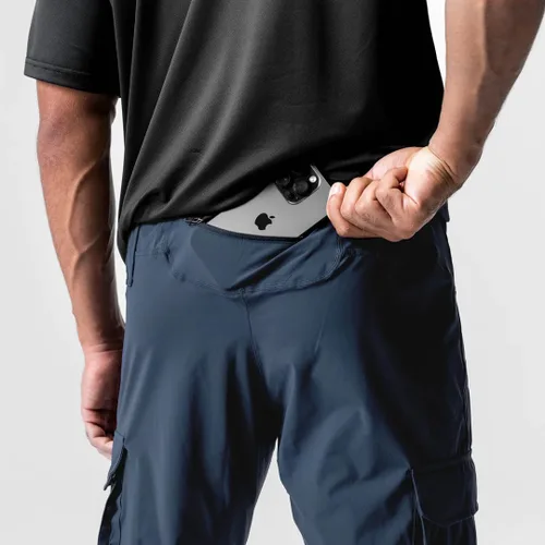 Miniatura 5 de Pantalones de entrenamiento ligeros para hombre con bolsillos con cremallera