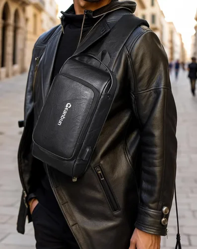 Miniatura 7 de Geanbun Bolso bandolera antirrobo para hombre, bandolera de piel sintética a la moda, mochila USB para el pecho para viajes