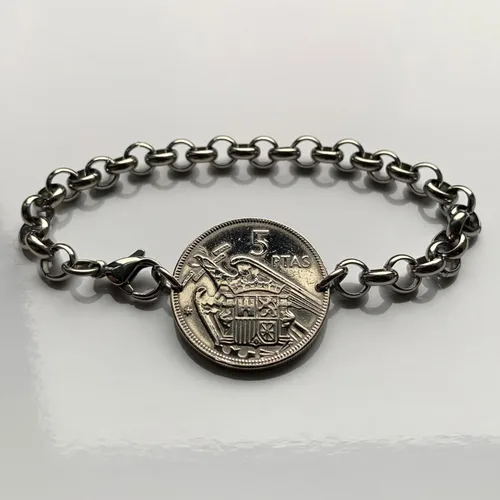 Miniatura 2 de 1957 España España Moneda 5 Pesetas Pulsera Hombre Águila de San Juan Escudo Español Madrid Barcelona Murcia Asturias Cataluña Las Palmas Vigo Gijón