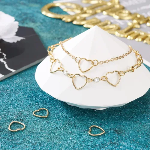 Miniatura 2 de Pandahall - 5 anillos de eslabones de latón con forma de corazón de oro de 14 quilates, marcos de enlace de bisel abierto, dijes de conector hueco