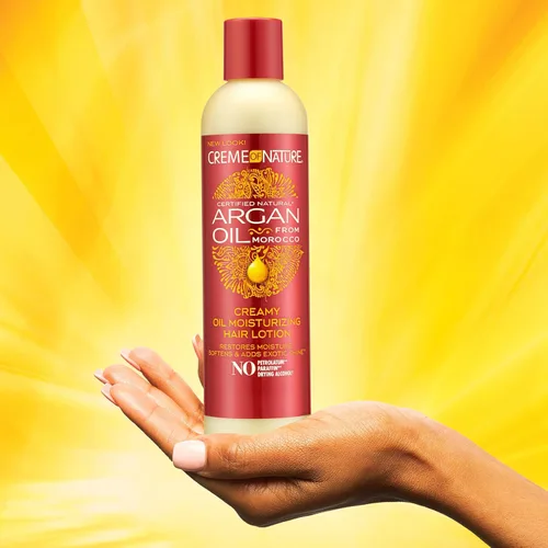 Miniatura 2 de Creme of Nature, Loción capilar de aceite de argán, espumante cremoso de aceite para ayudar a restaurar la humedad y añadir brillo, 8.45 onzas