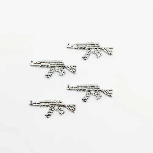 Miniatura 4 de Juego de 40 dijes de aleación 3D para uñas, pistola de metal brillante con diamantes de imitación, dijes de arte de uñas AK para armas, diamantes