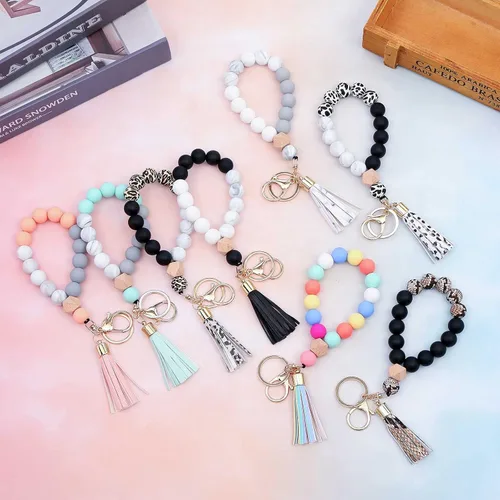 Miniatura 7 de BAOSIWA - Llavero de silicona para mujer, con borla de cuero