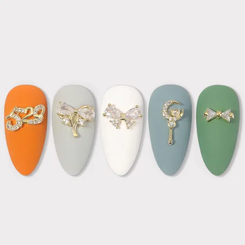 Miniatura 4 de Dijes y gemas para uñas, circonita de cobre dorado, múltiples formas 3D, diamantes de imitación de metal de lujo para uñas, 14 piezas