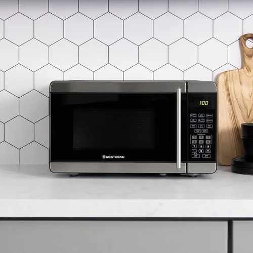 Miniatura 6 de Horno microondas West Bend de 700 vatios, diseño compacto de encimera con 6 configuraciones precocinadas, descongelamiento rápido, panel de control