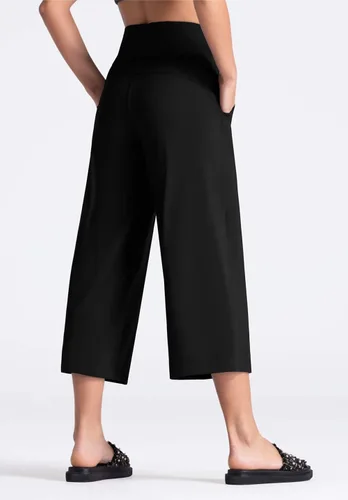 Miniatura 4 de THE GYM PEOPLE Bootleg - Pantalones capri de yoga para mujer, control de abdomen, cintura alta, pantalones cortos acampanados con bolsillos