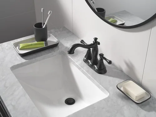 Miniatura 2 de Delta Faucet Cassidy Gold - Grifo de baño central, conjunto de drenaje de metal, bronce champán 2597LF-CZMPU, 5.41 x 6.59 x 5.41 pulgadas Champagne