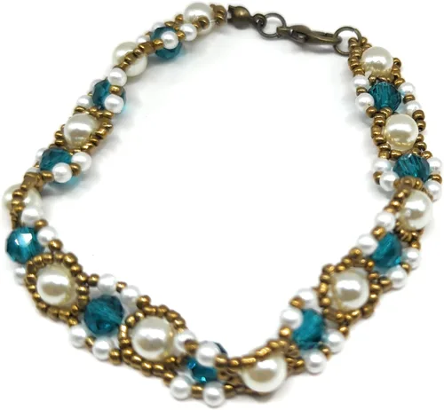 Elegante brazalete para dama hecho a mano de perlas fantasia, cuentas de vidrio y cristales de 7.5" de largo, ideal para regalo, se envía empaque