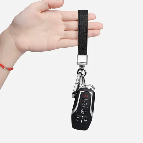 Miniatura 6 de QBUC Llavero universal de cuero genuino para automóvil, accesorios de metal resistente, llavero de automóvil con giro giratorio de 360 grados y Negro