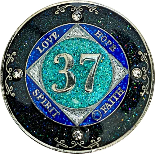 Miniatura 47 de NA 1 año de cristales y medallón de purpurina, moneda chapada en color plateado, arco iris negro, purpurina azul y cuatro cristales transparentes