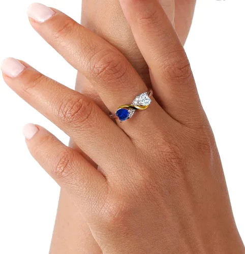 Miniatura 5 de Anillo de plata de ley 925 y oro amarillo de 10 quilates con forma de corazón azul creado y moissanita clásica para siempre de Charles & Colvard