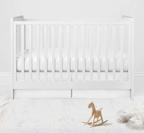 Bacati Falda de cama sólida para cuna/niño pequeño, color blanco, 13 pulgadas