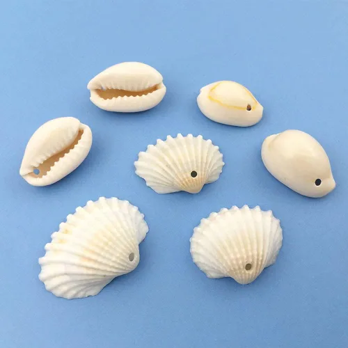 Miniatura 8 de 100 cuentas redondas y ovaladas blancas de 0.433 x 0.709 in, perfectas para joyas temáticas de playa de verano