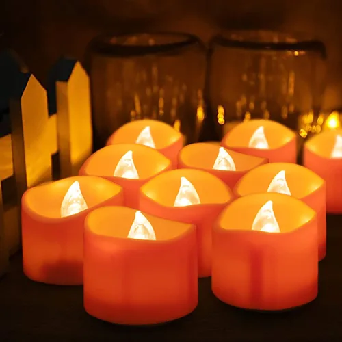 Miniatura 6 de Homemory Paquete de 12 velas de té naranja de Halloween, velas LED que funcionan con pilas, luces de calabazas pequeñas, sin llama, velas de té