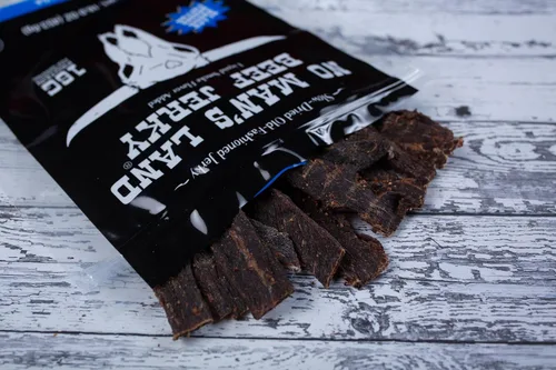 Miniatura 4 de No Man's Land Beef Jerky - Bocadillo de Carne de Res Bajo en Calorías, Bajo en Carbohidratos, Alto en Proteínas - Sabor PIMIENTA NEGRA 16oz