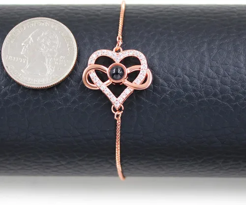Miniatura 8 de Pulsera ajustable de cadena de plata/oro rosa, 4 dijes de corazón diferentes en 100 idiomas con texto en inglés "Say I Love You", pulsera