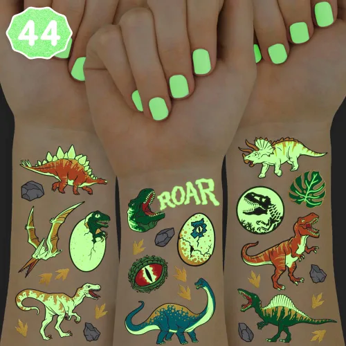 xo, Fetti Tatuajes temporales de dinosaurios - 44 piezas que brillan en la oscuridad | Suministros para fiesta de cumpleaños, recuerdos de fiesta de