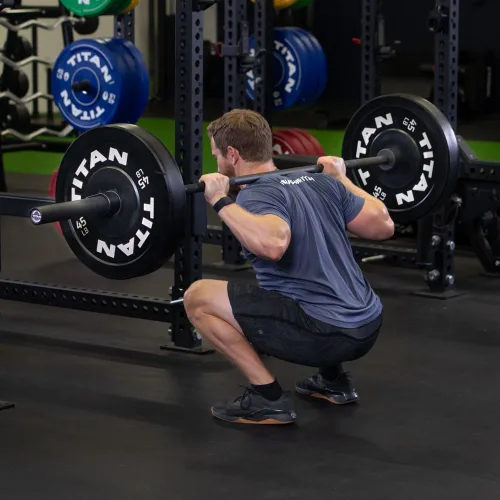 Miniatura 4 de Titan Fitness Black Cerakote - Barra olímpica de la serie TITAN de 44.1 lbs y 1.122 in, hecha en Estados Unidos, con clasificación de 1,500 libras