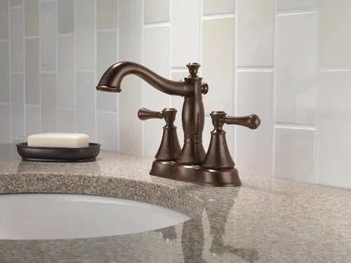 Miniatura 6 de Delta Faucet Cassidy Gold - Grifo de baño central, conjunto de drenaje de metal, bronce champán 2597LF-CZMPU, 5.41 x 6.59 x 5.41 pulgadas Champagne