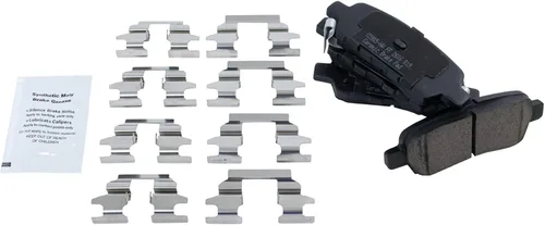 Miniatura 7 de TRQ Kit de pastillas de freno de cerámica premium traseras y rotor recubierto con productos químicos compatibles con Nissan