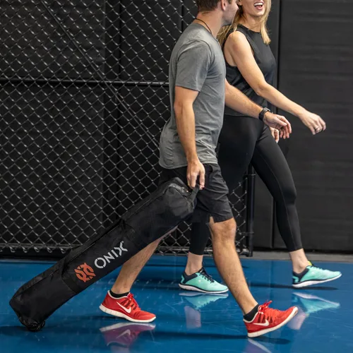 Miniatura 8 de ONIX Pickleball 2 en 1 Juego de red portátil de tamaño reglamentario y red de práctica incluye estuche de transporte con ruedas