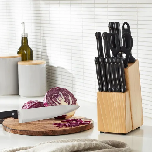 Miniatura 8 de Amazon BasicsJuego de cuchillos de cocina de 14 piezas, cuchillas de acero inoxidable de alto carbono con bloqueo de madera de pino, negro