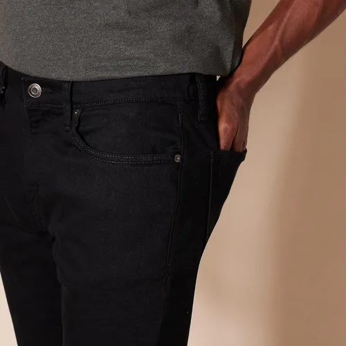 Miniatura 3 de Amazon Essentials Jeans elásticos ajustados para hombre - Colores descontinuados