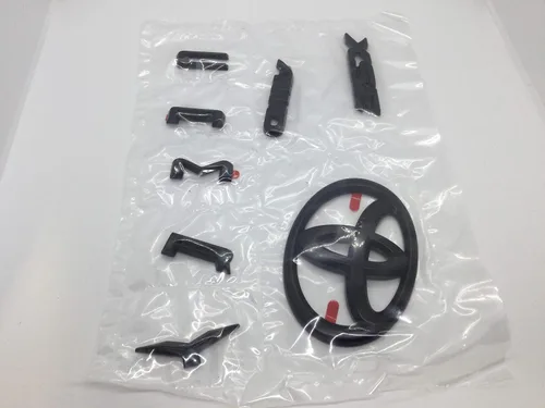 Kit de superposición de emblema negro de tracción en las cuatro ruedas genuino de Toyota 2020-2024 Camry XSE AWD PT948-03211-02