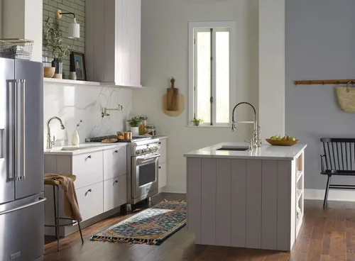 Miniatura 7 de Moen WeymouthBrushed Gold S73104BG - Grifo de cocina con resorte de preenjuague de un mango con refuerzo de potencia para una limpieza más rápida