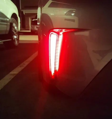 Miniatura 4 de iJDMTOY Luces reflectoras de parachoques LED de lente roja compatibles con Toyota Corolla Sedán 2019-22, funciona como faros antiniebla traseros