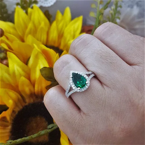 Miniatura 57 de Dazzlingrock Collection Anillo de compromiso con forma de lágrima y diamante blanco natural redondo de 0.45 quilates con halo de diamantes blancos