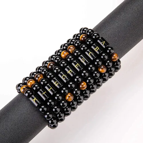 Miniatura 5 de Brazalete hecho a mano con letra inicial del nombre, las cuentas son de ónix negro u ojo de tigre, la cuerda es trenzada, un brazalete lleno