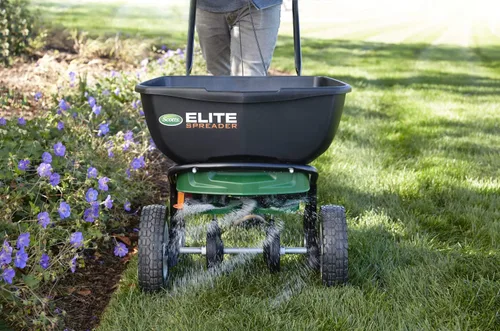 Miniatura 6 de Scotts Esparcidor Elite para semillas de césped, malezas y fertilizante, sal y derretimiento de hielo, esparcidor de empuje duradero con capacidad