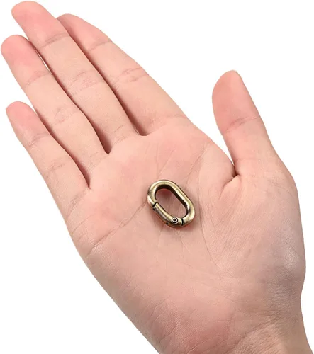 Miniatura 3 de uxcell Anillo ovalado de resorte, clip de resorte redondo, hebilla de resorte para bolsos, monederos, llavero bronce