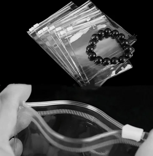 Paquete de 100 bolsas de PVC autoselladas con cierre de cremallera, bolsa transparente antioxidación, prevención de deslustre, bolsa sellada