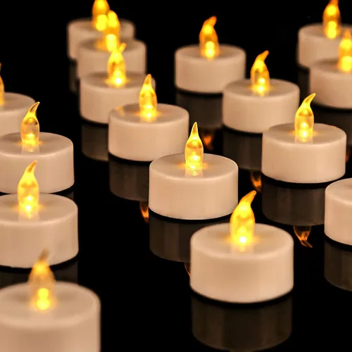 JUNPEI - Paquete de 24 velas de té con luz LED amarilla cálida, velas sin llama, realistas, brillantes y parpadeantes, para la celebración Velas de